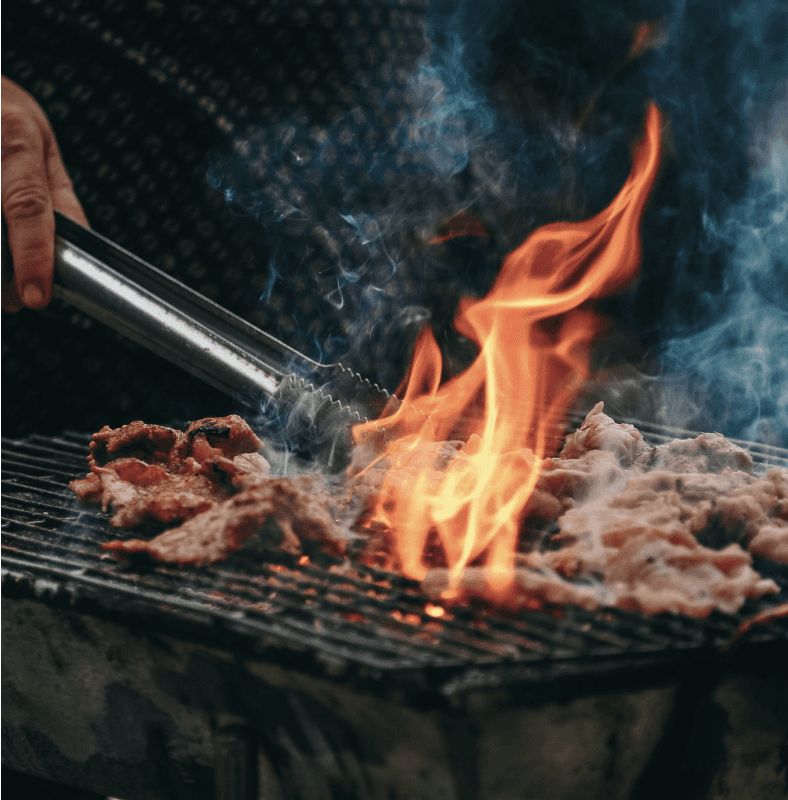 A steak being grilled.