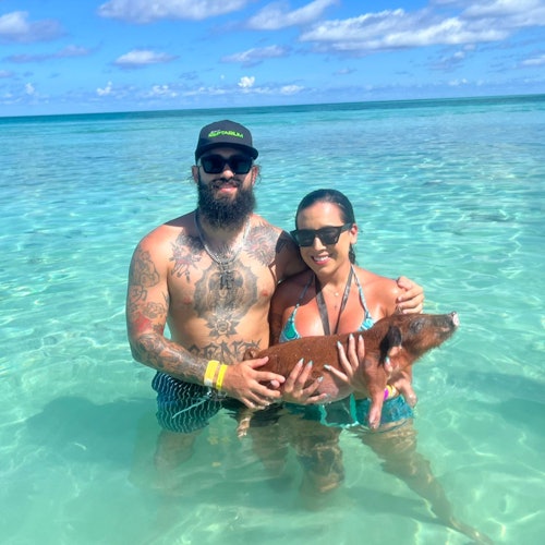 A lovely couple enjoying the beach with our little friends 🐷