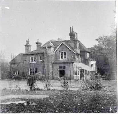 Rear view of the original Hollies house and garden in the 1950s