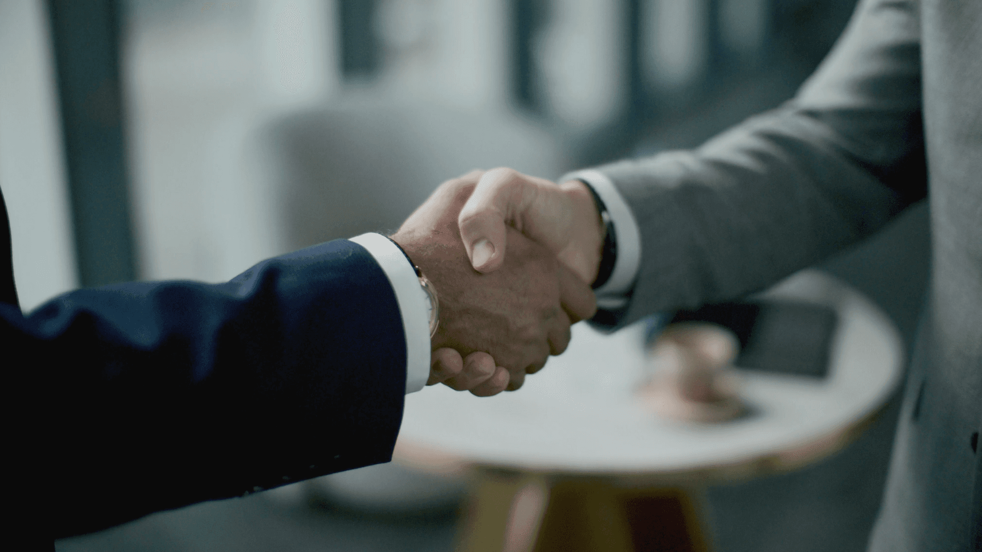 selective focus photography of woman holding camera gimbal