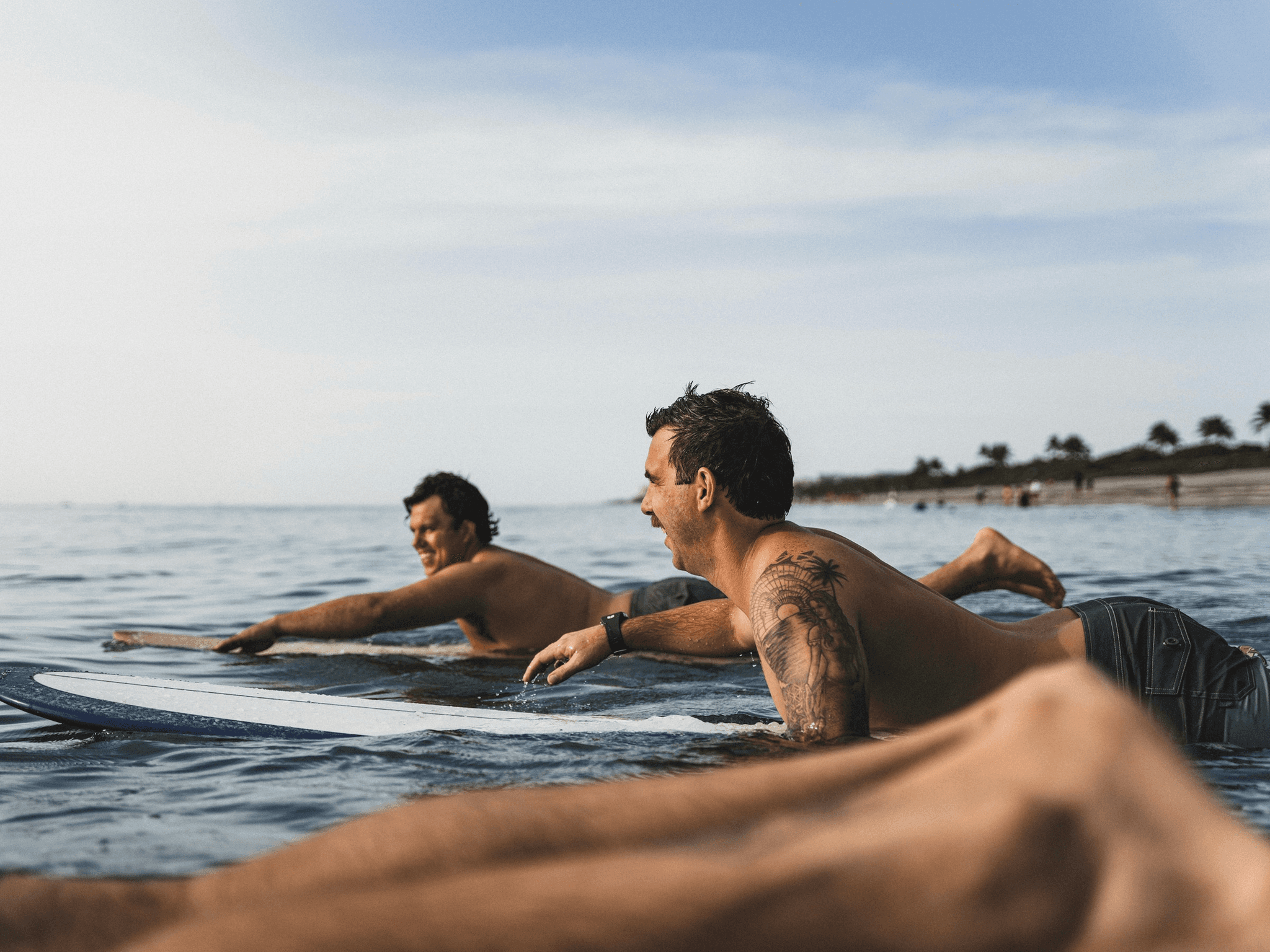 A man learning to surf