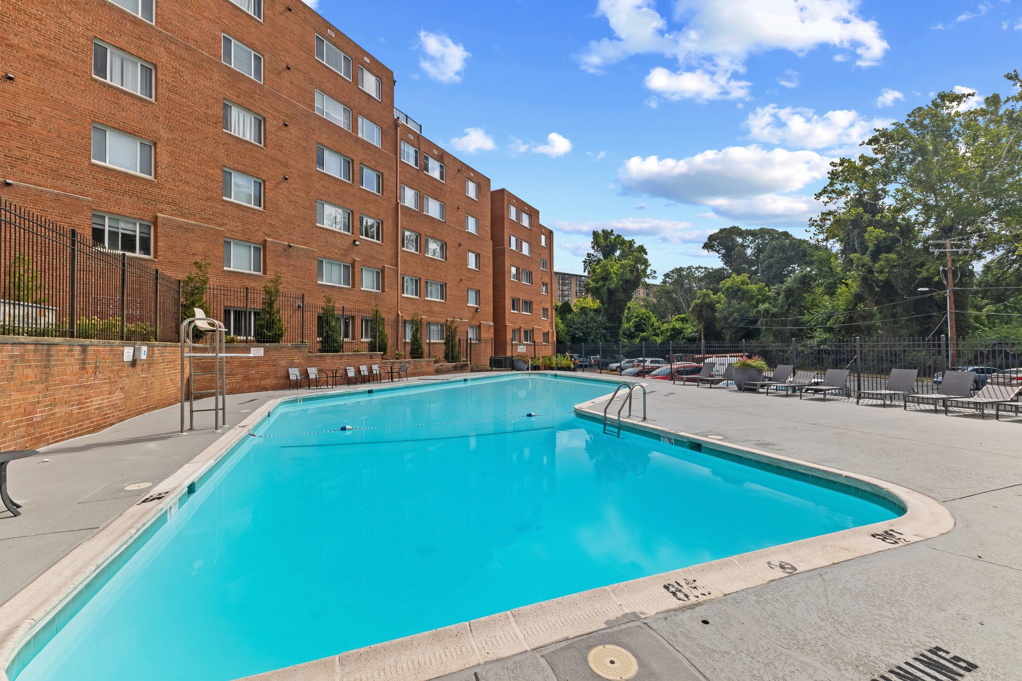 female similing while looking up at the clouds