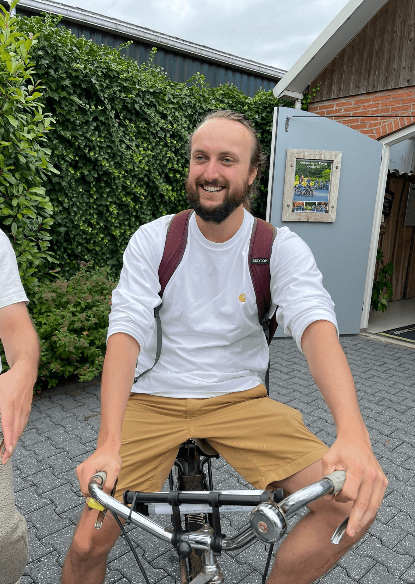 A young man riding a bicycle