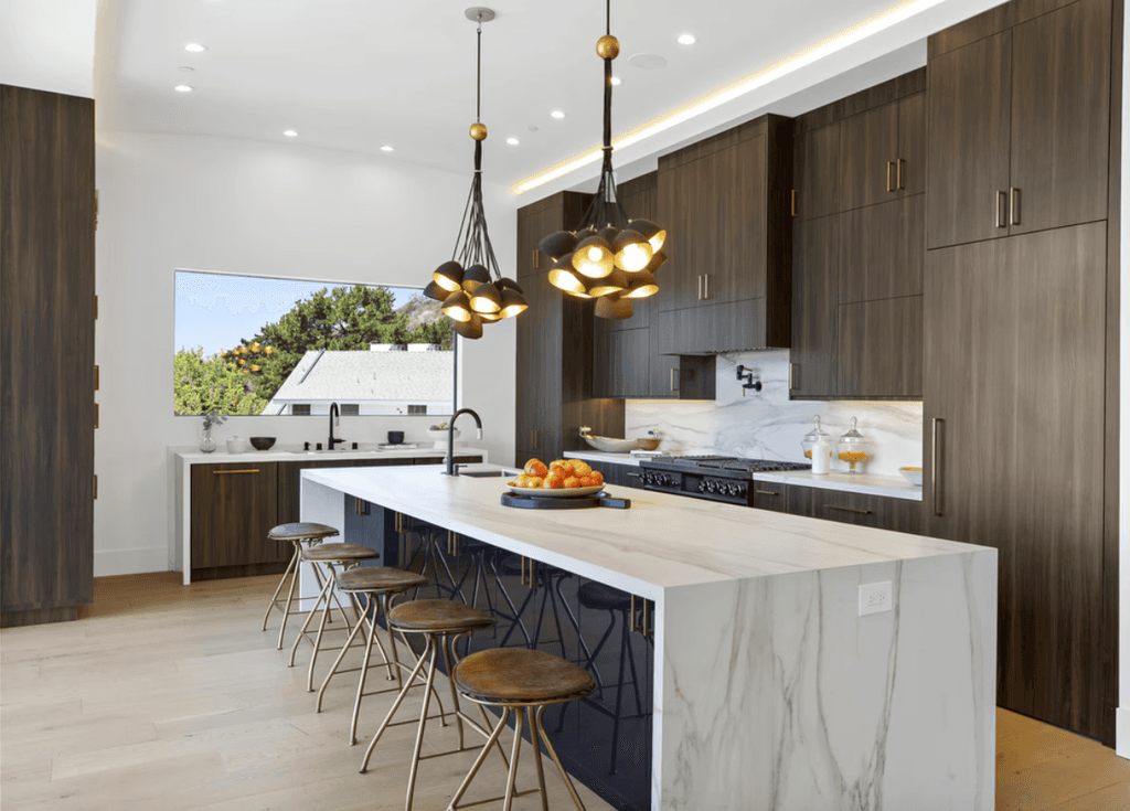 modern brown kitchen two dishwashers chandeliers