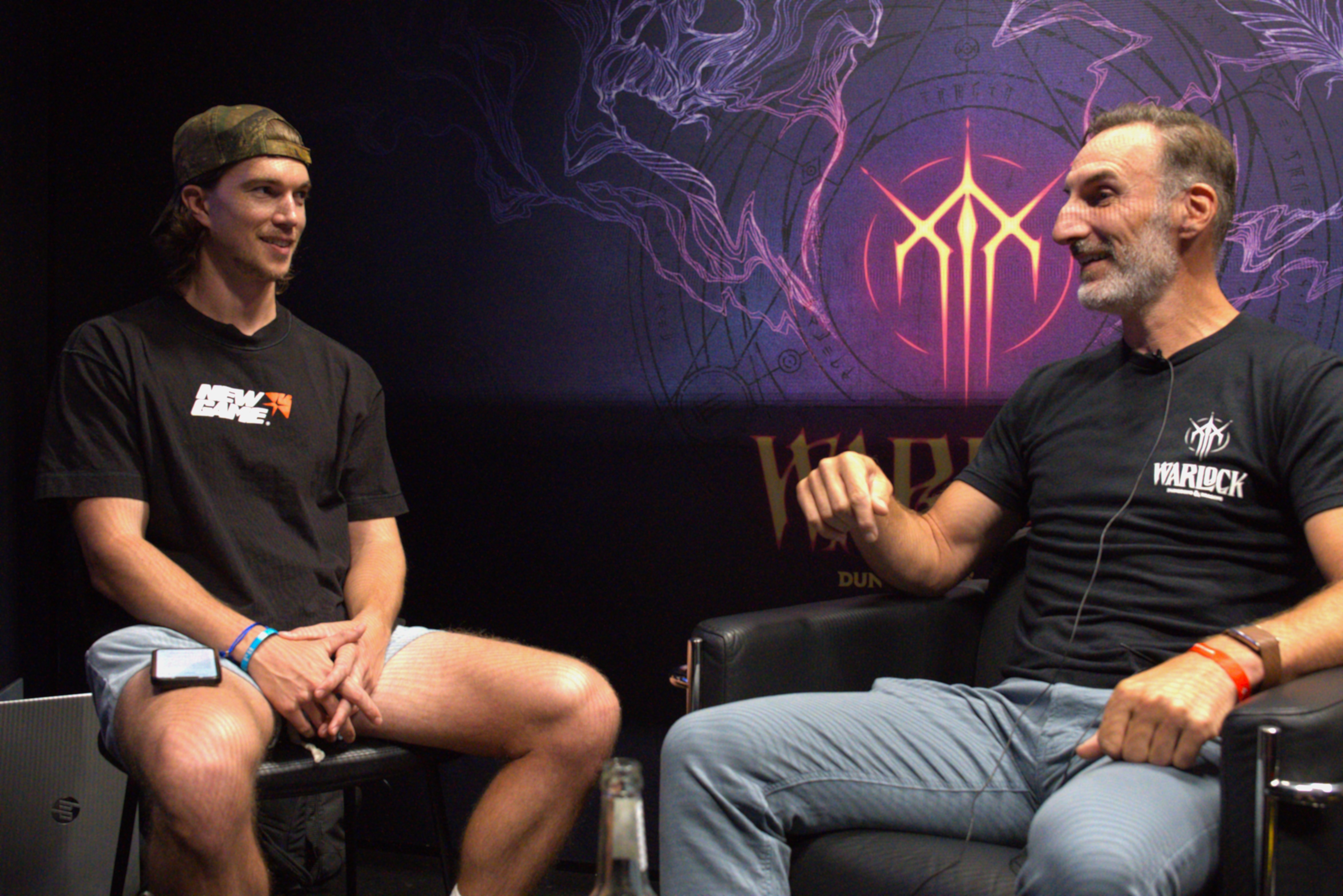 Interviewer Jake Lucky with Warlock Creative Director Jeffrey Hattem