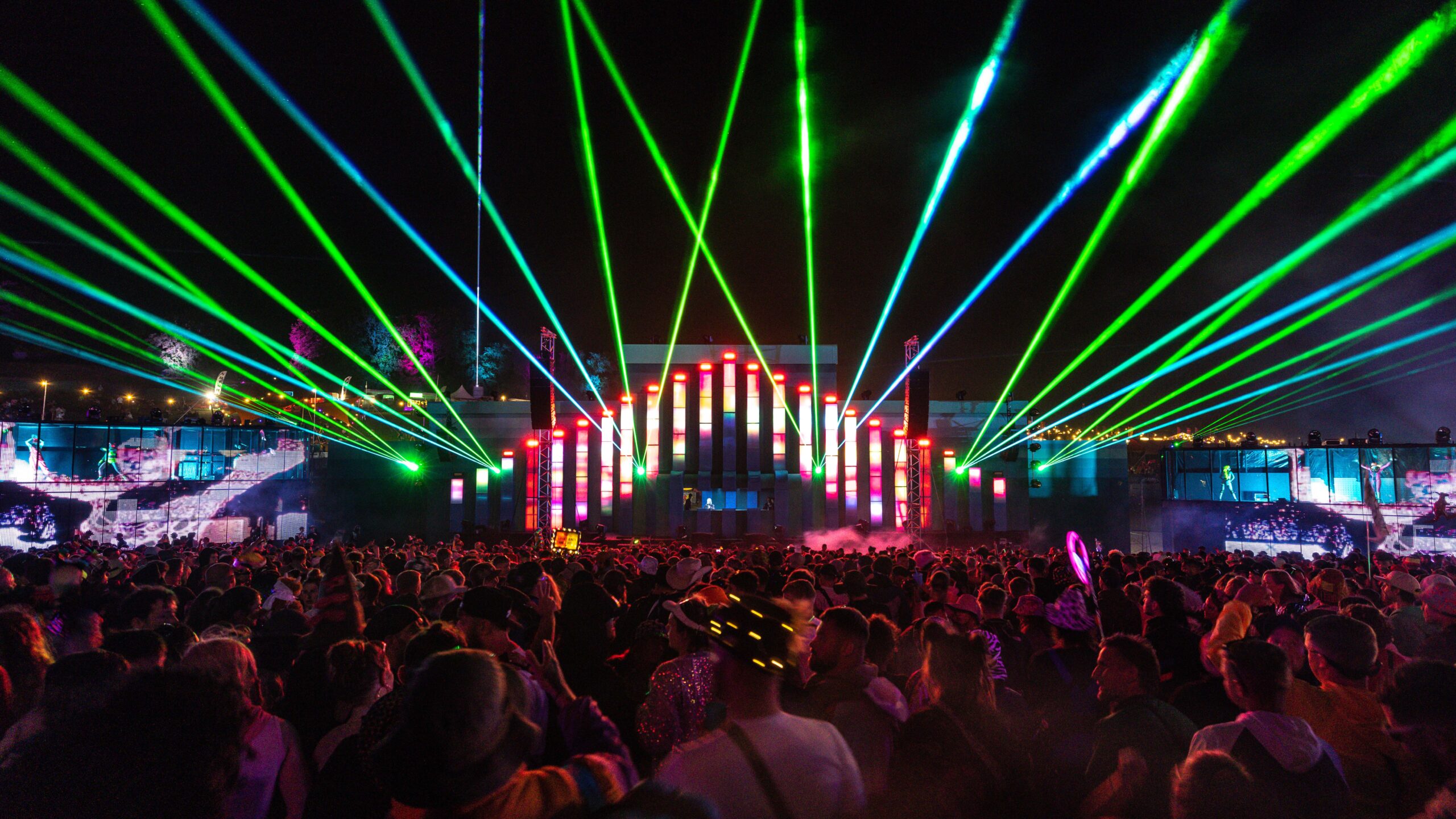 a person's hand reaching up into the air