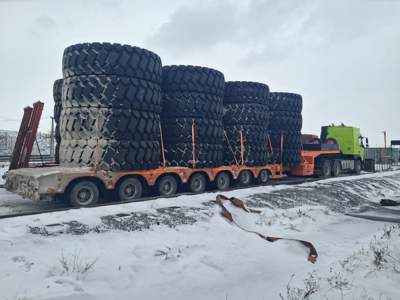 Two men and lady packaging boxes