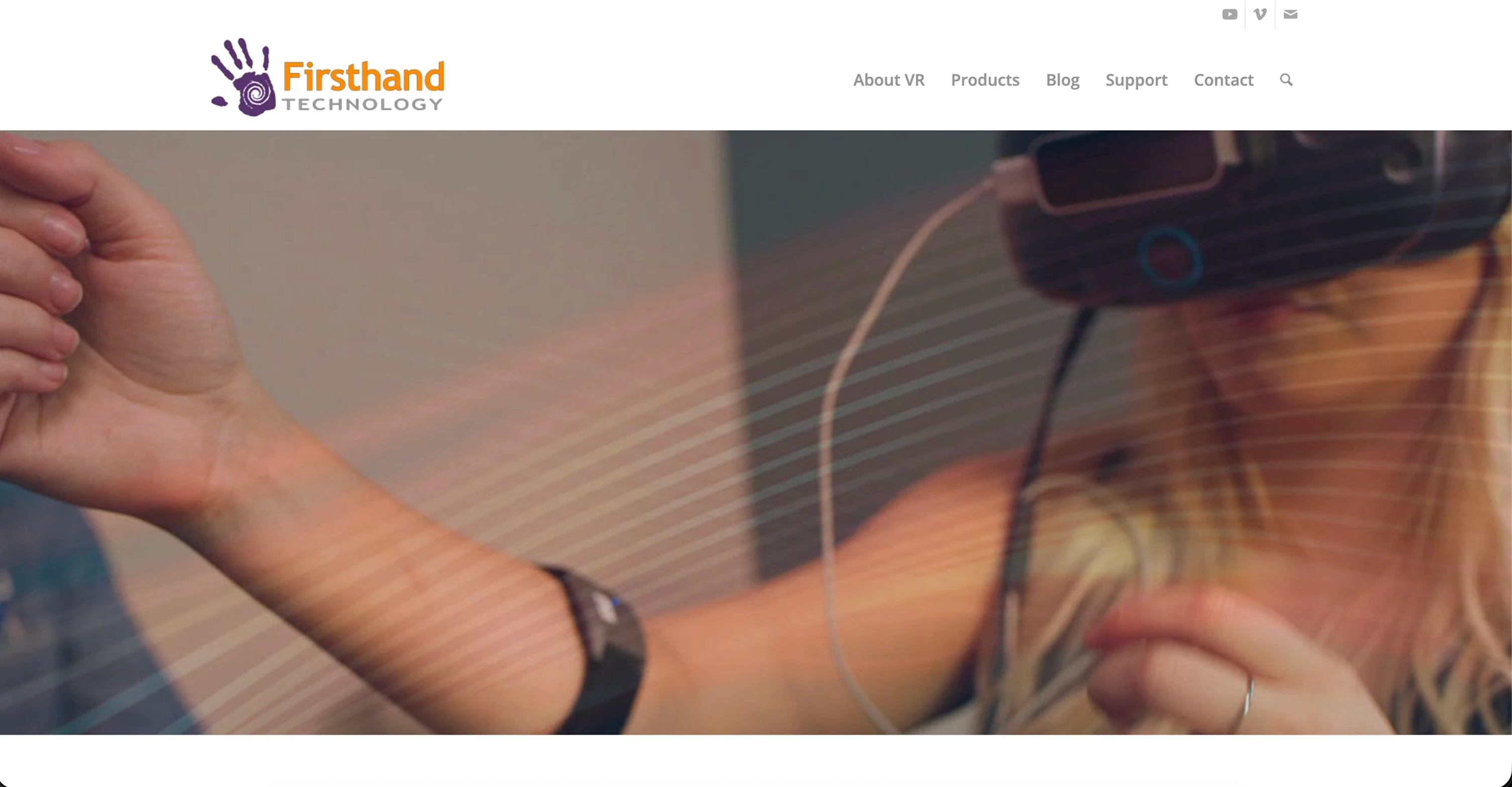 Firsthand Technology website showing a patient wearing a VR headset during clinical therapy