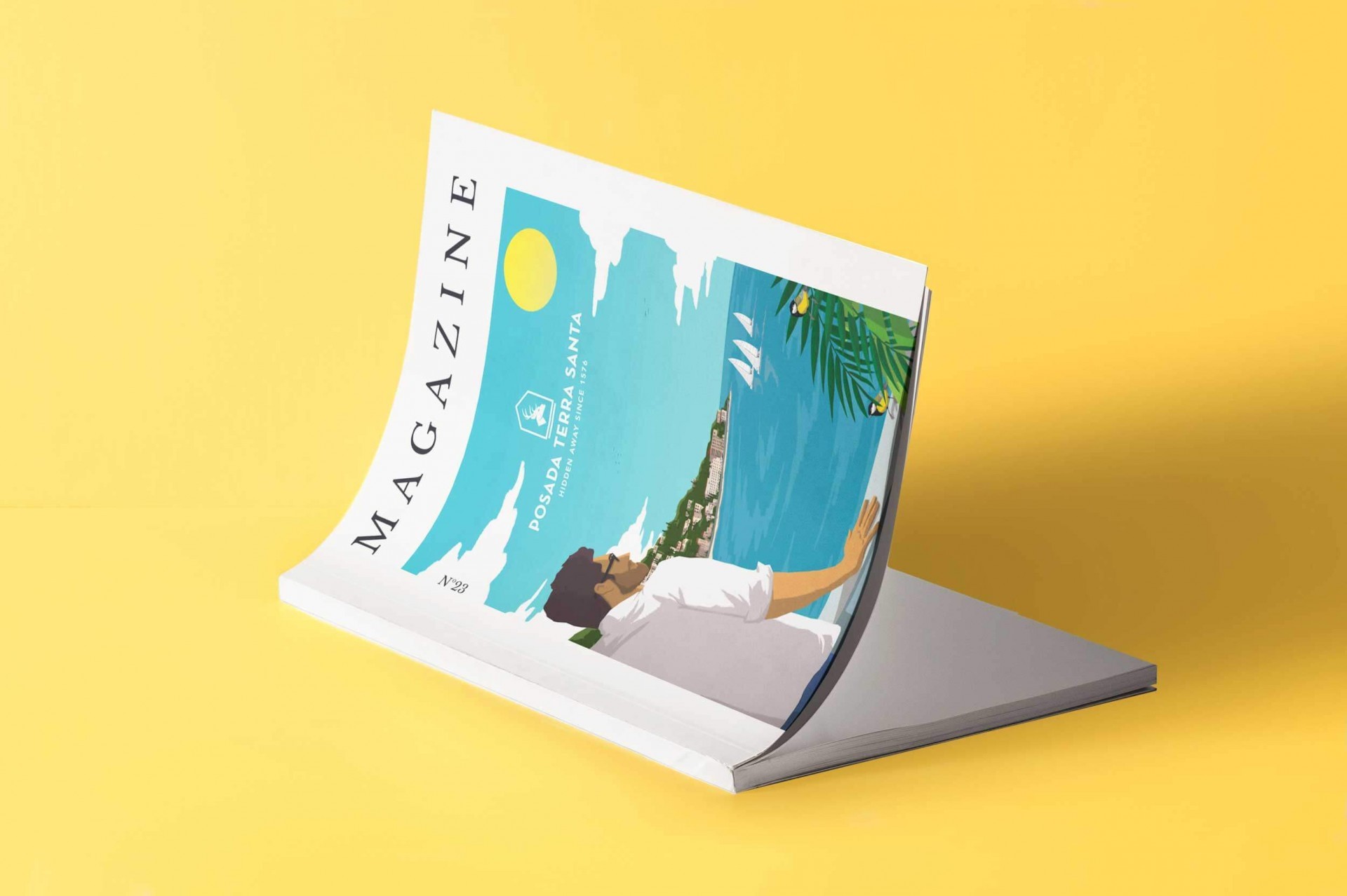 Revista abierta con portada ilustrada en fondo amarillo.