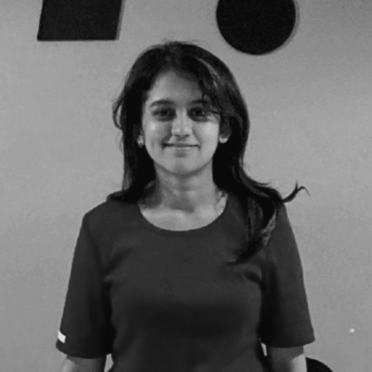 a black and white photo of a man with a beard