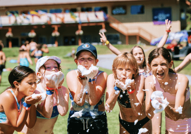 blue and white globe near body of water during daytime