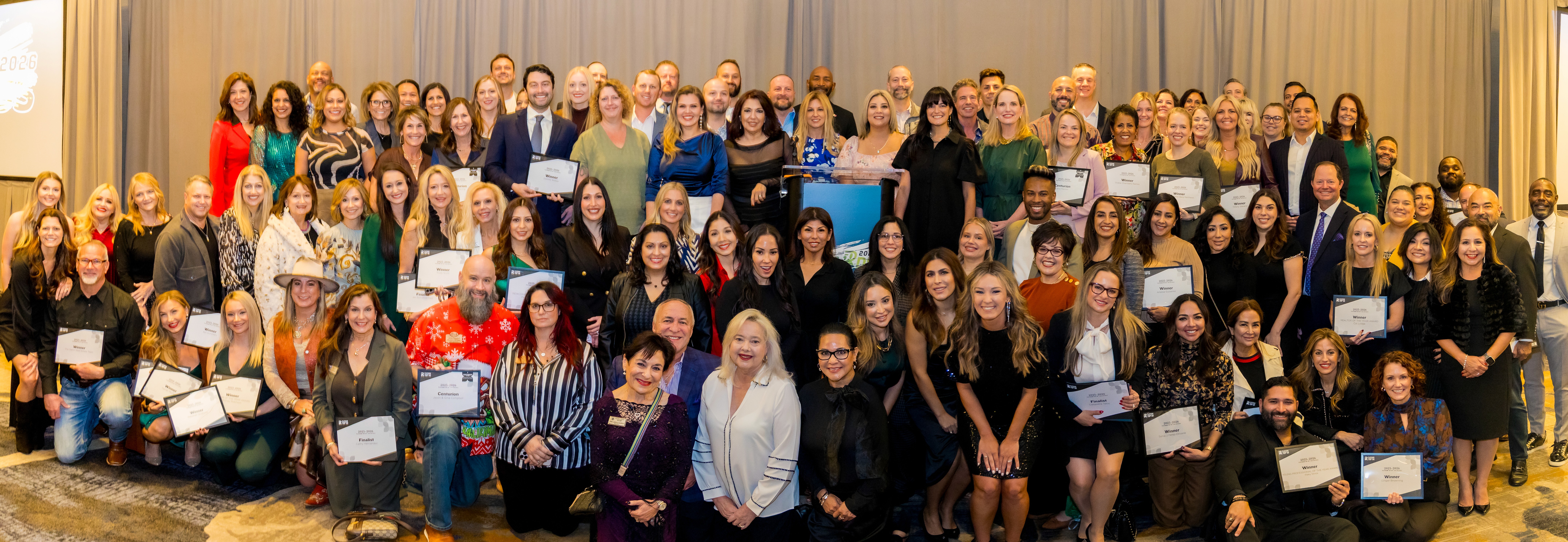 Group Photo of Pt50 Winners and Finalists on stage