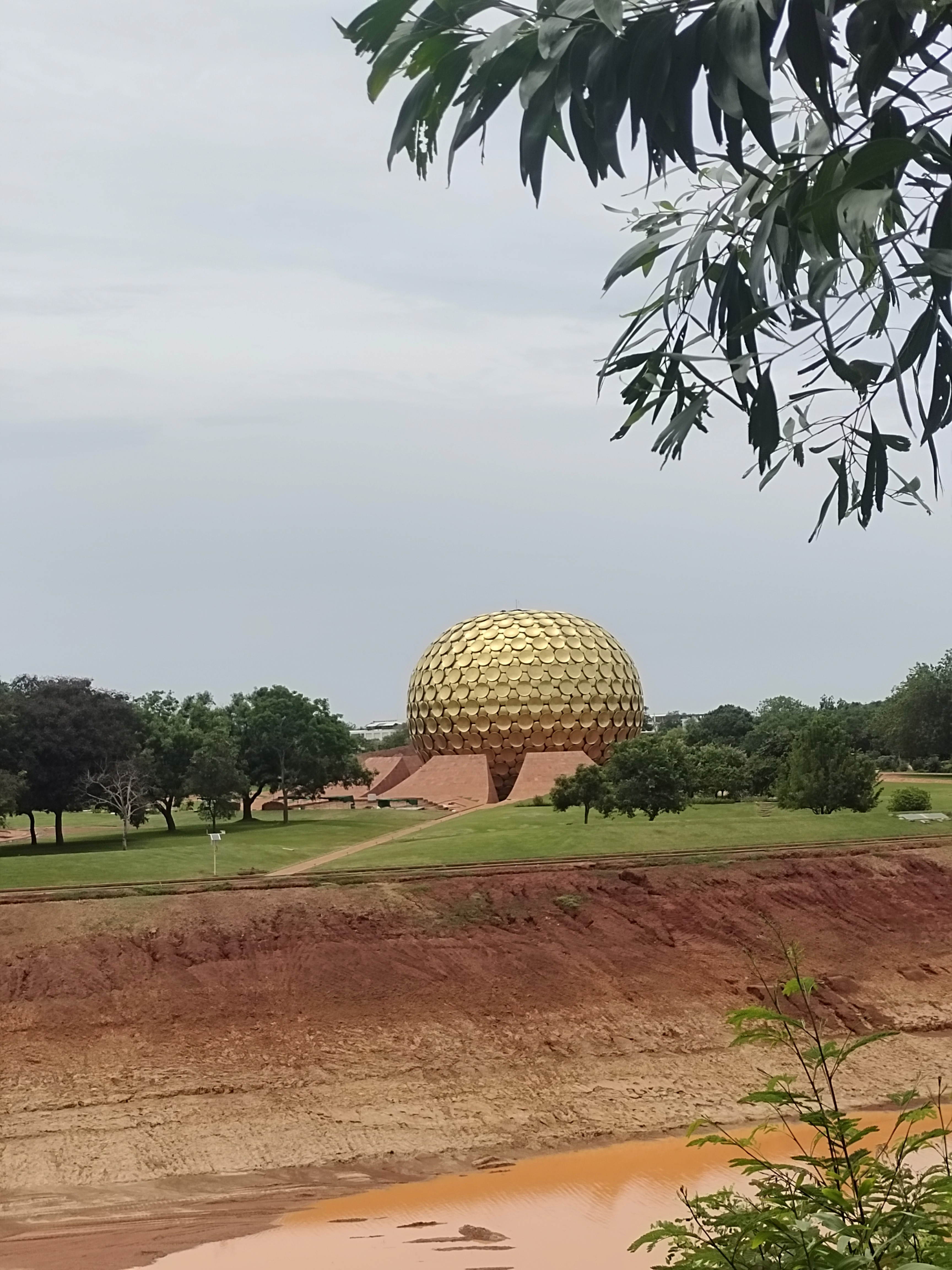a group of people walking on a sidewalk