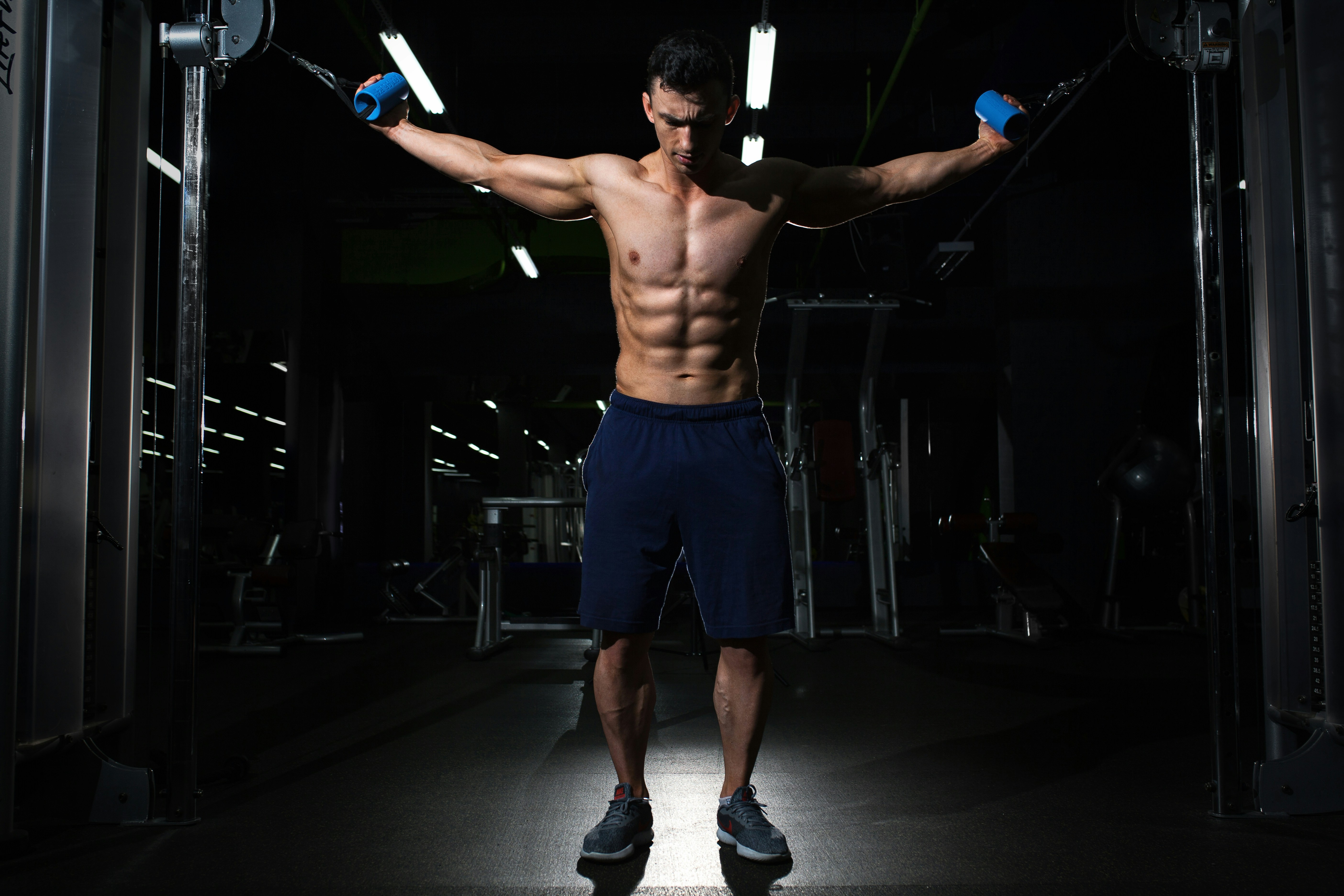 A Picture of a Bodybuilder Performing a Chest Exercise