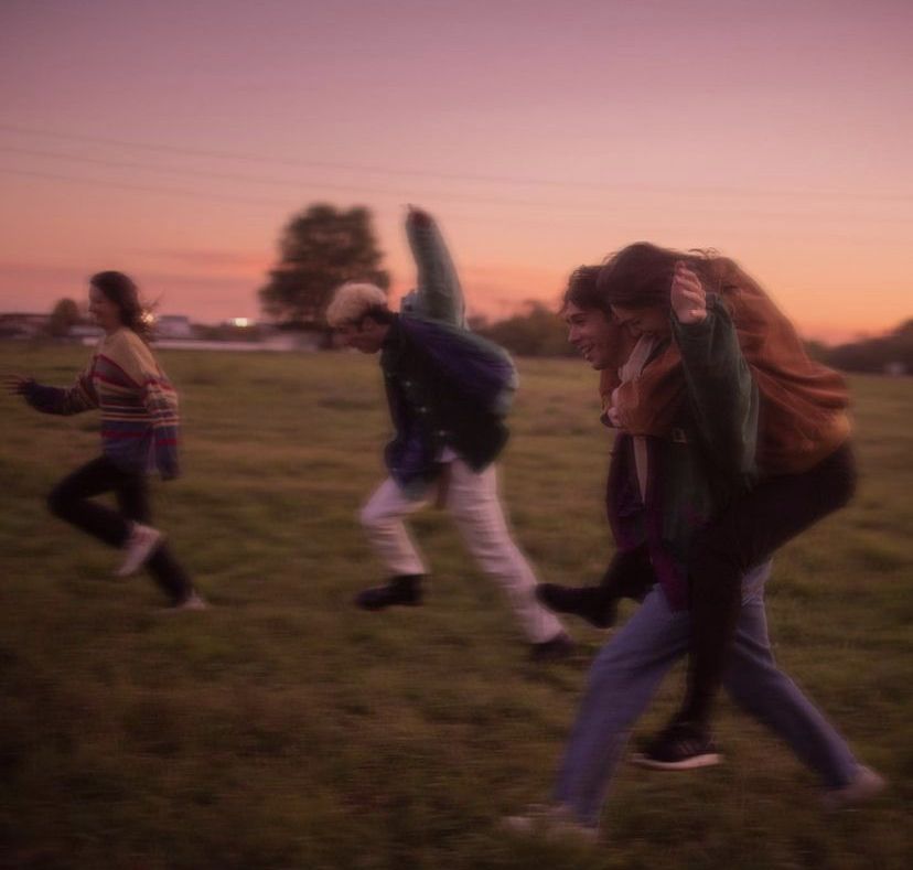 woman standing near blue steel gate