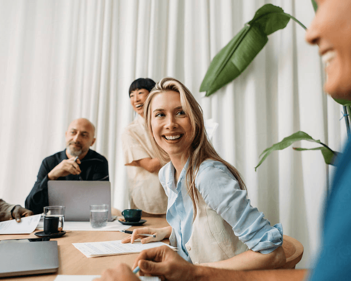 People smiling during a meeting