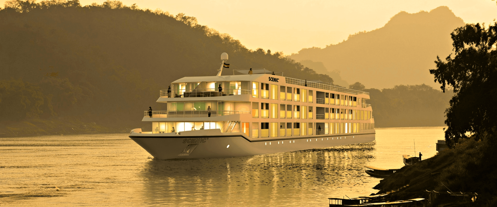 Luxury river cruise ship at sunset