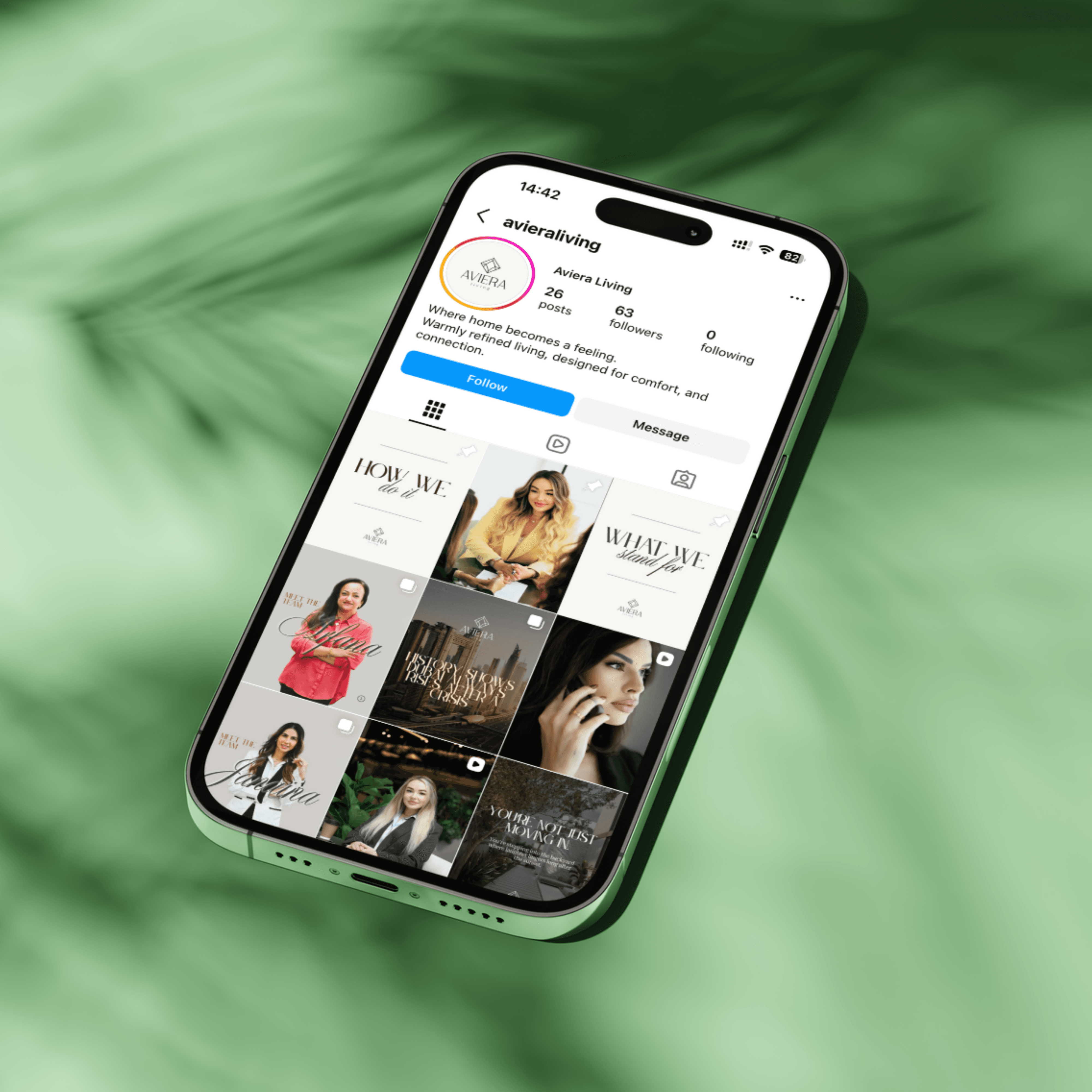 Black-and-white party photo of a smiling man in a check blazer among a crowd.