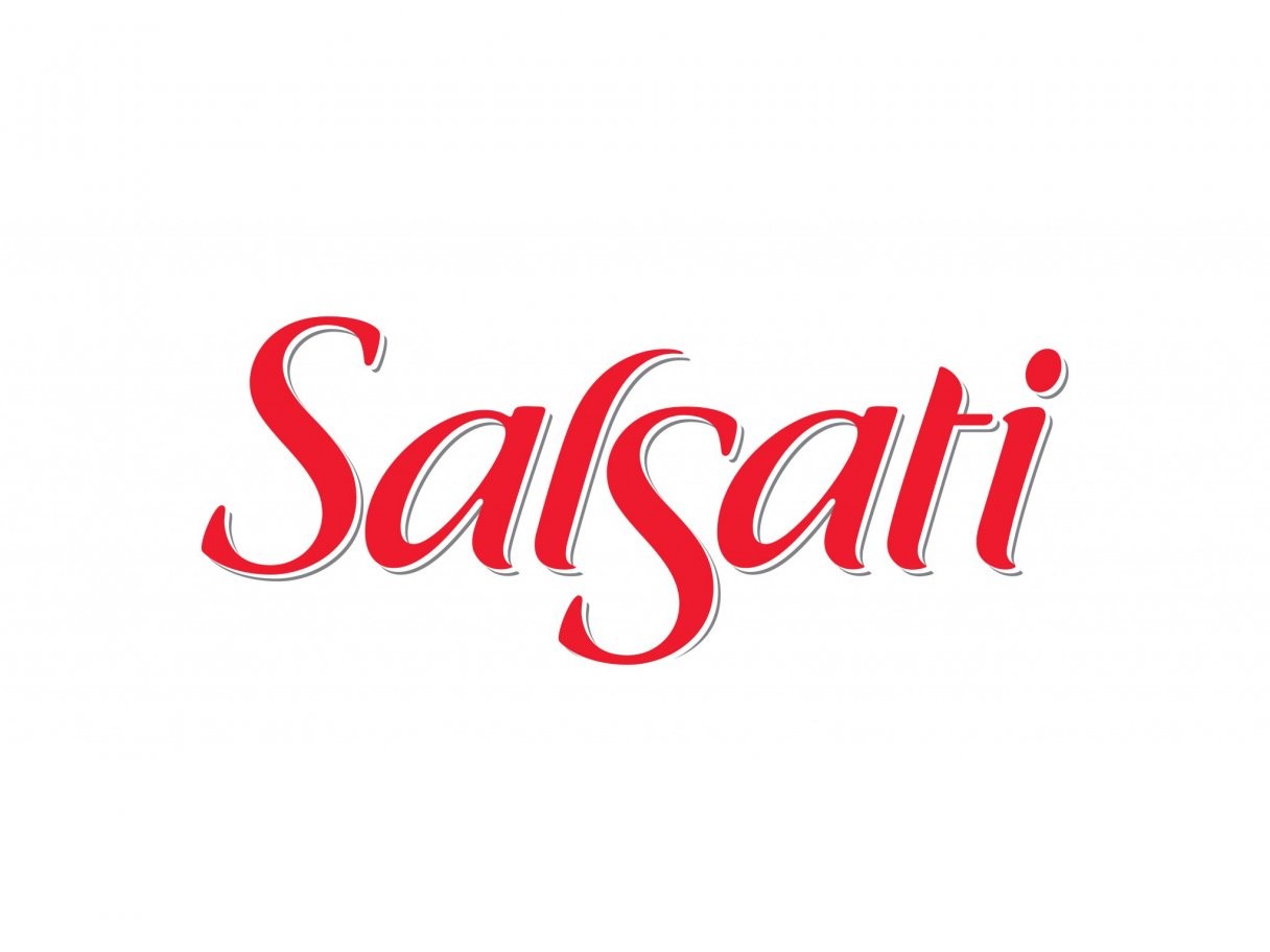 Rustic cabin in a golden field at sunset