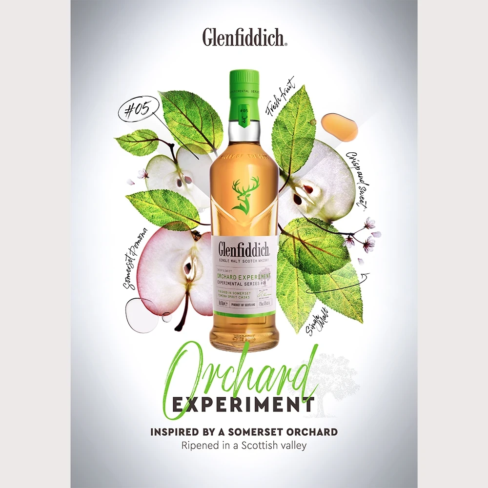 Whisky bottle in front of apple slices and leaves. Text saying 'Glenfiddich Orchard Experiment'