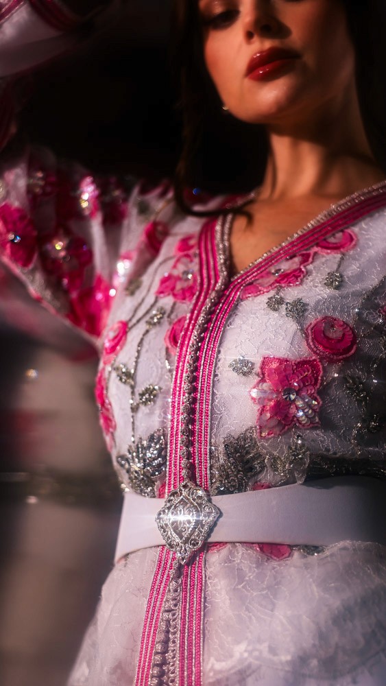 Blush pink Moroccan caftan with delicate embroidery, handcrafted luxury design for refined occasions in Bahrain