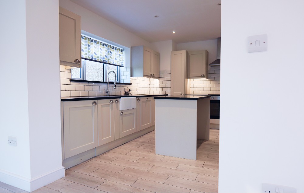Brand new kitchen installation by Barry Turner and Son with under cudboard lighting and tiling