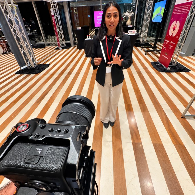 Dr. Tanisha Shekdar, ND, filming with a POV Marketing camera operator