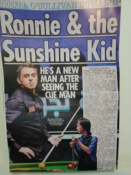 sunny akani and ronnie in a newspaper