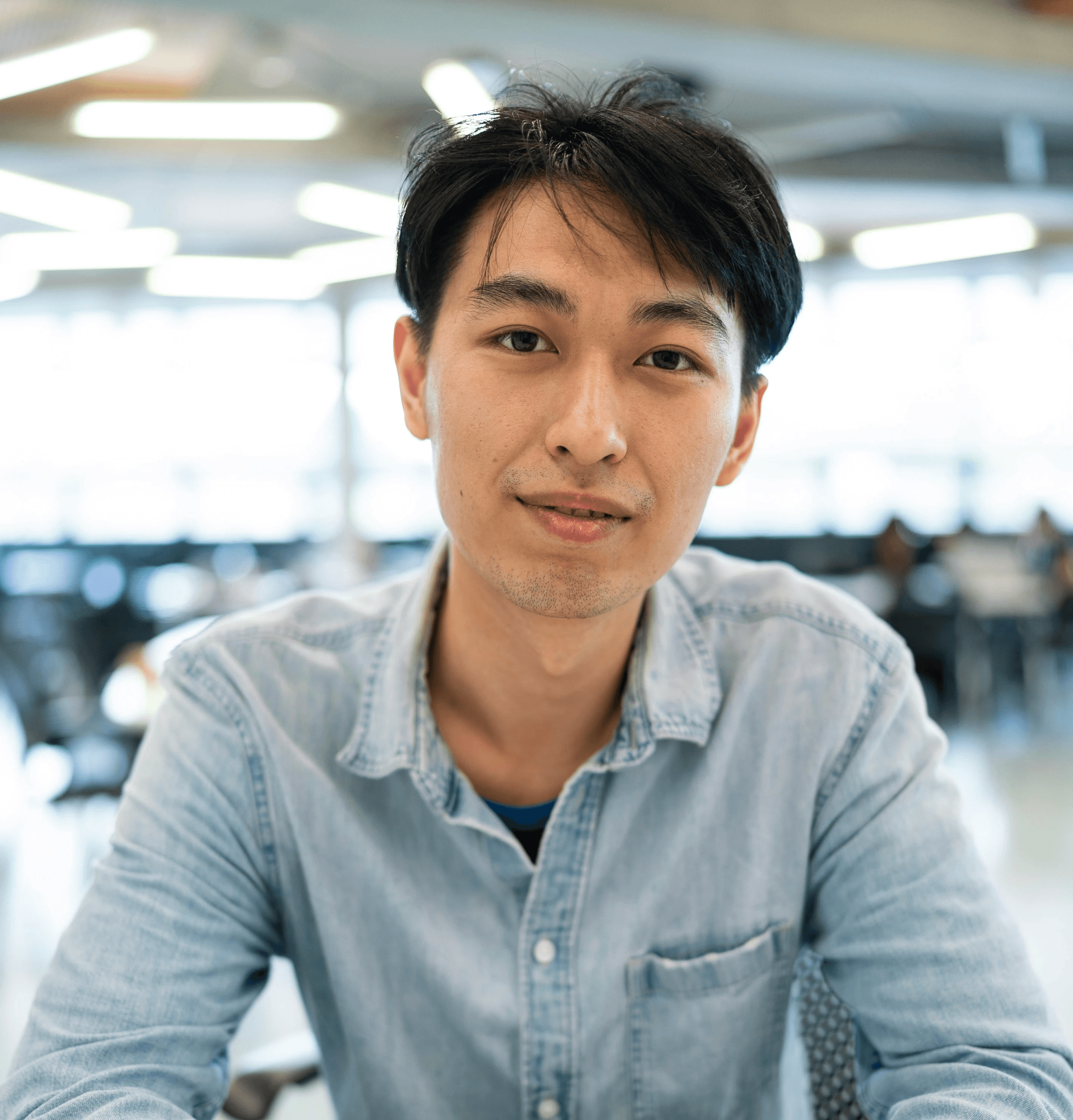 man wearing blue dress shirt