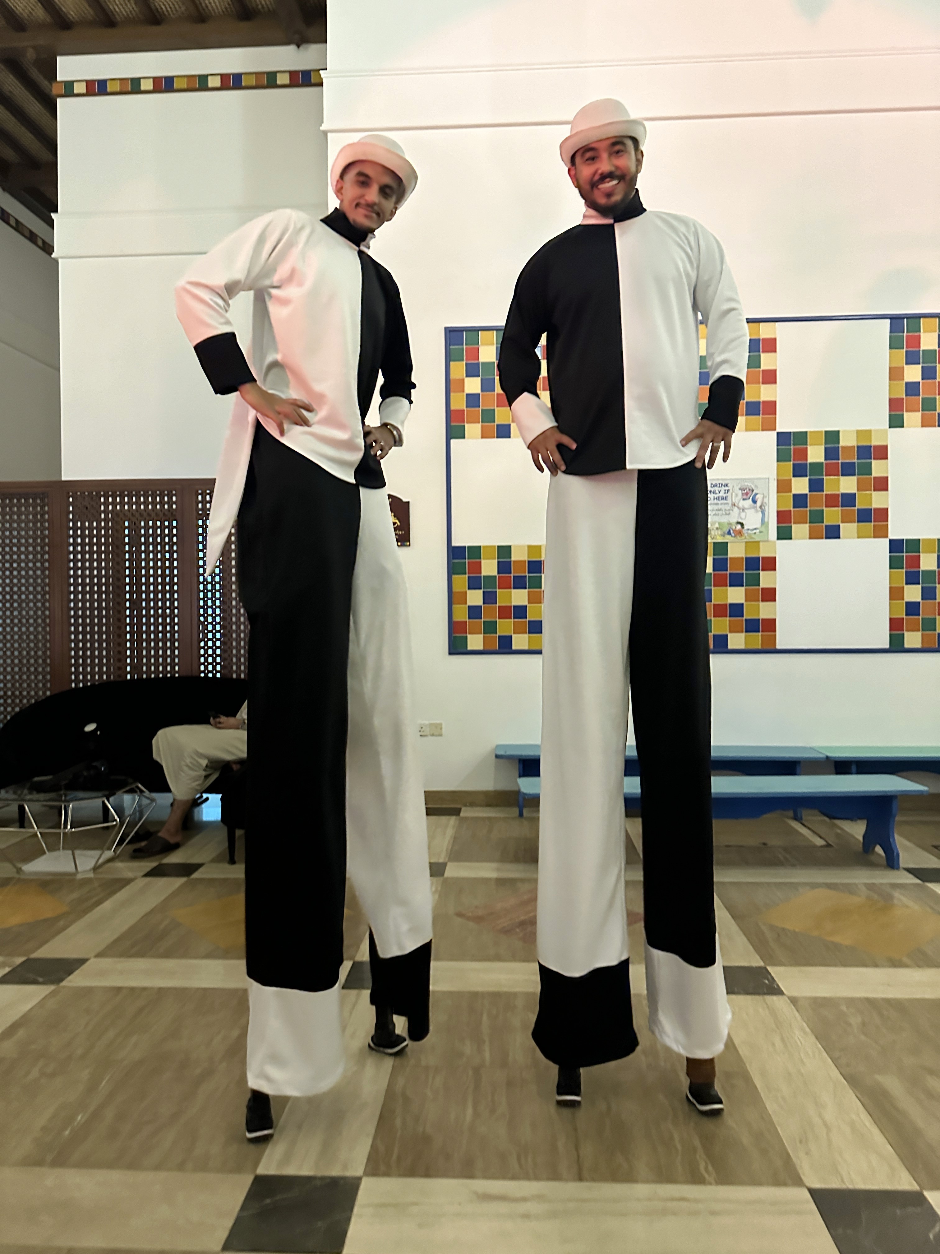 Stilt walkers roaming performers for corporate retreat entertainment in Oman