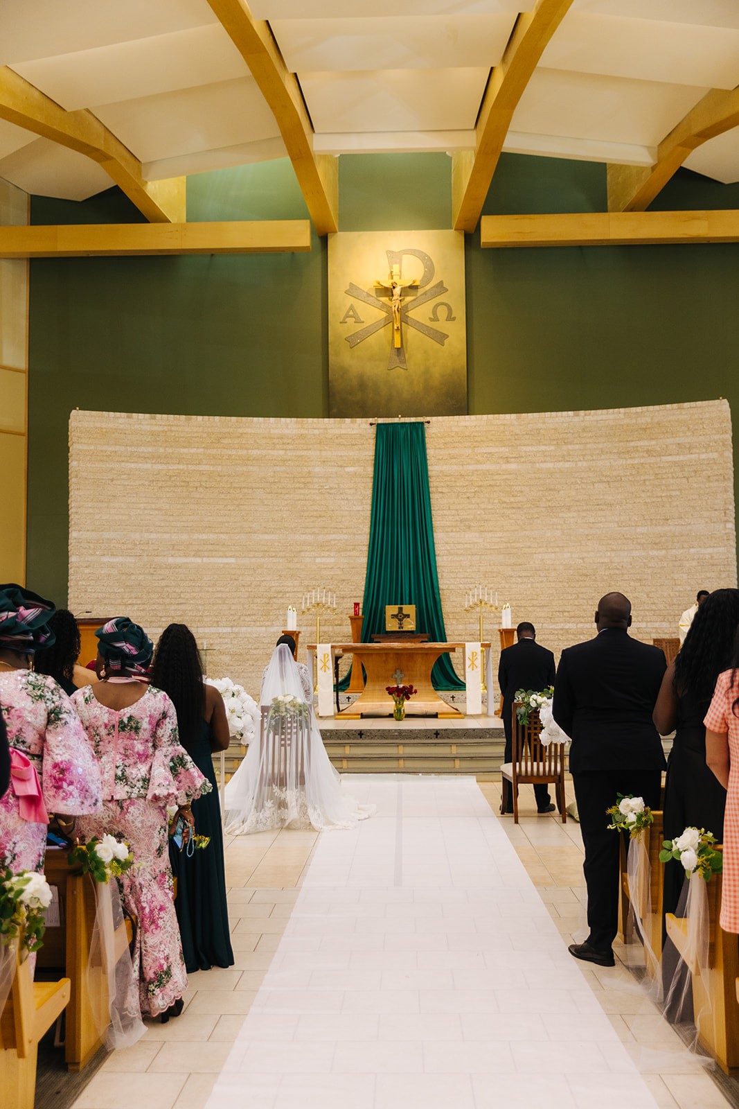 Bride and groom celebrating their wedding in canada, destination wedding with friends and family church