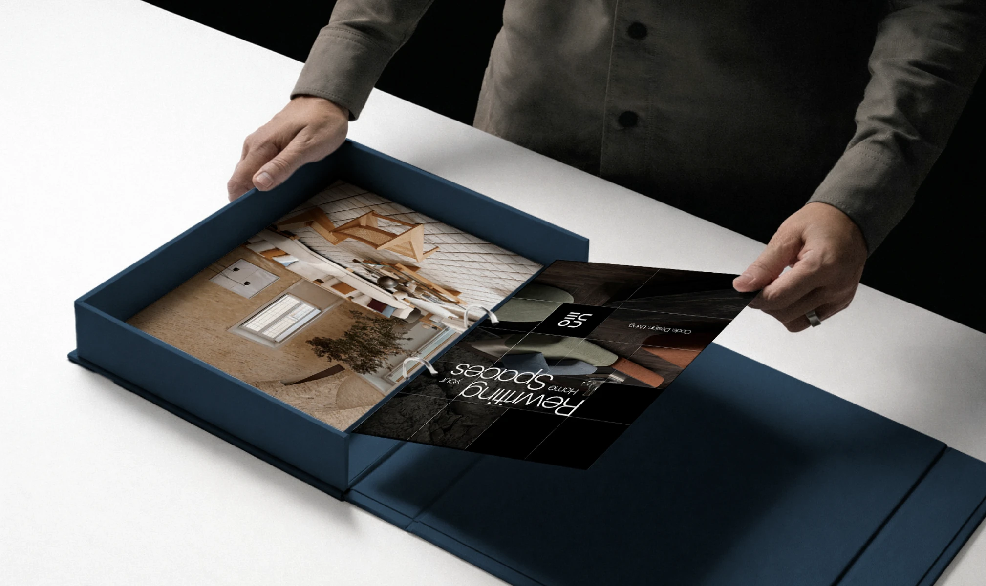 Presentation box with CODE brand identity materials, including interior design visuals and printed layout samples.