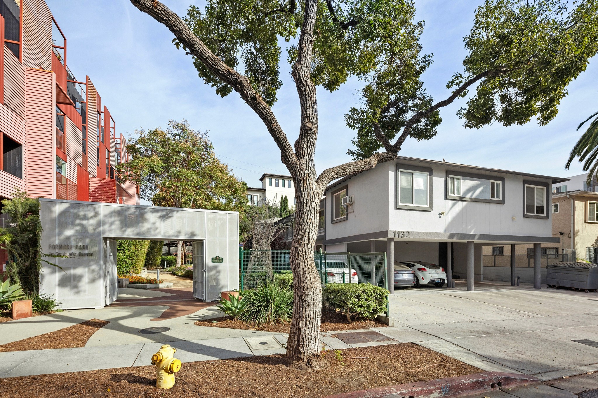 Exterior view of the hayworth portfolio loacted next to a public park and fetures nice landscaping.