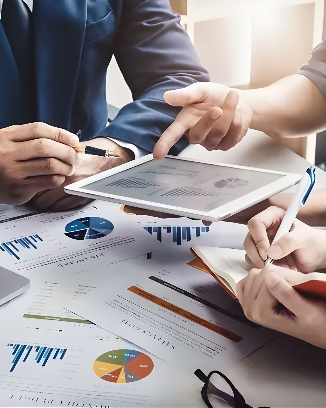 low angle photography of high rise building under blue sky during daytime