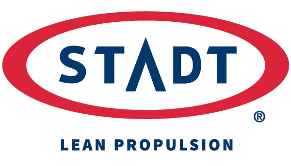 Logo of STADT, featuring a red oval with the word "STADT" in blue, and the tagline "LEAN PROPULSION" below.