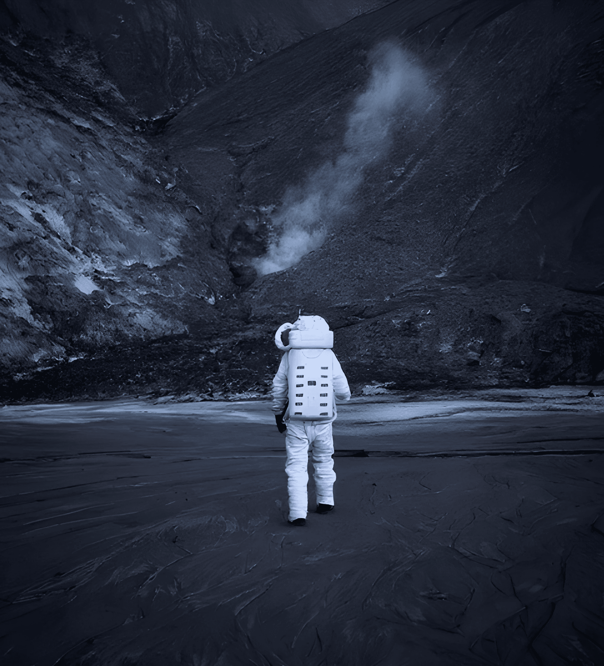 a person wearing a helmet and a cloak with a plain gradient background