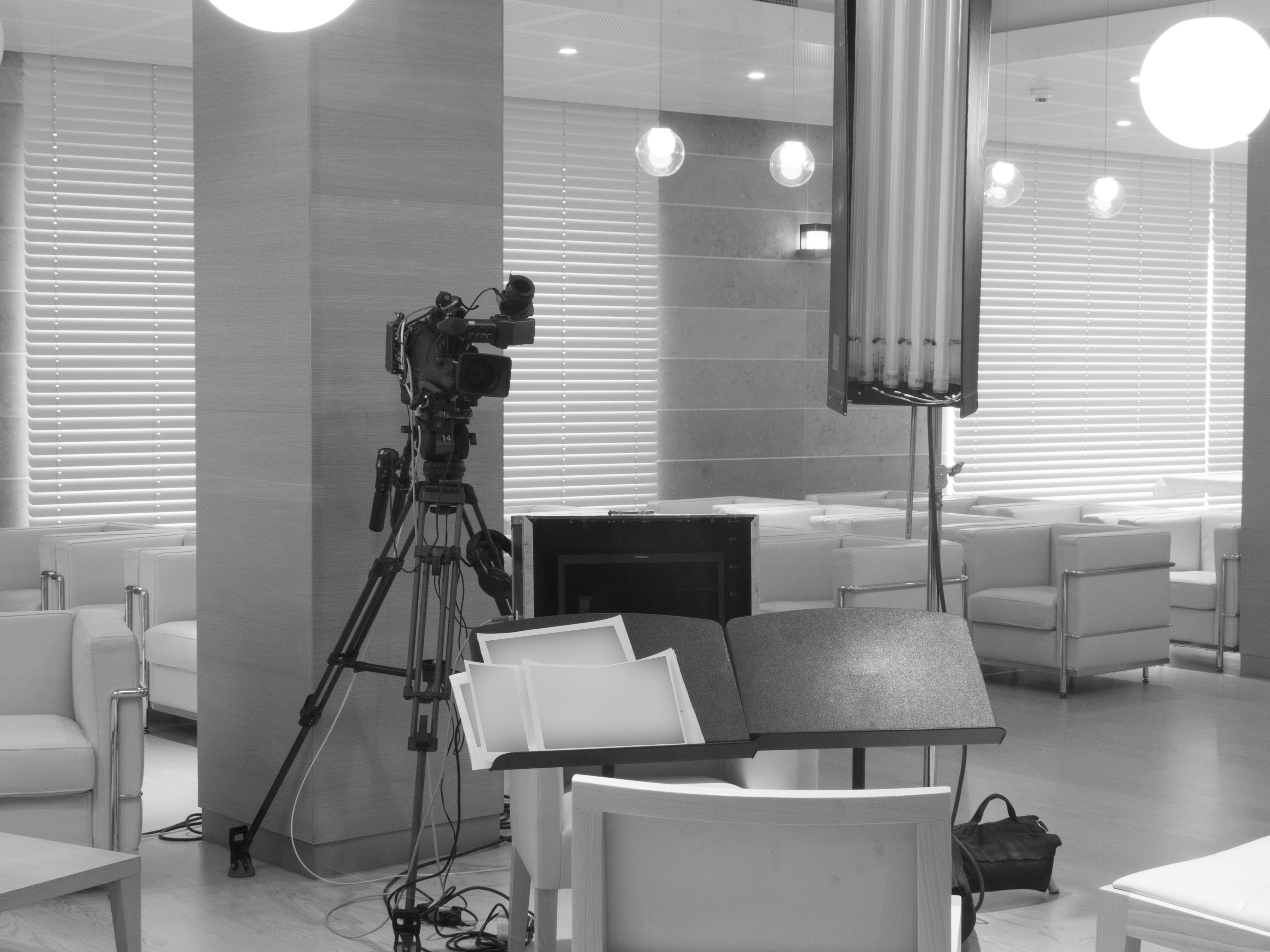 Professional TV camera set up in a large indoor venue or concert hall, representing high-end video production capabilities in Delhi.