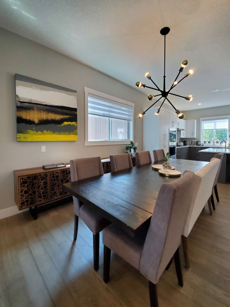 Image of KHD Homes luxurious dining room design with modern furniture and layout design elements for home renovations.