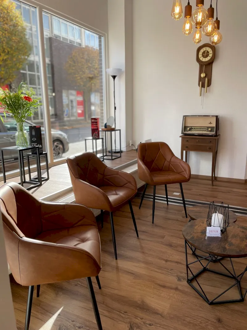 black flat screen tv on brown wooden table