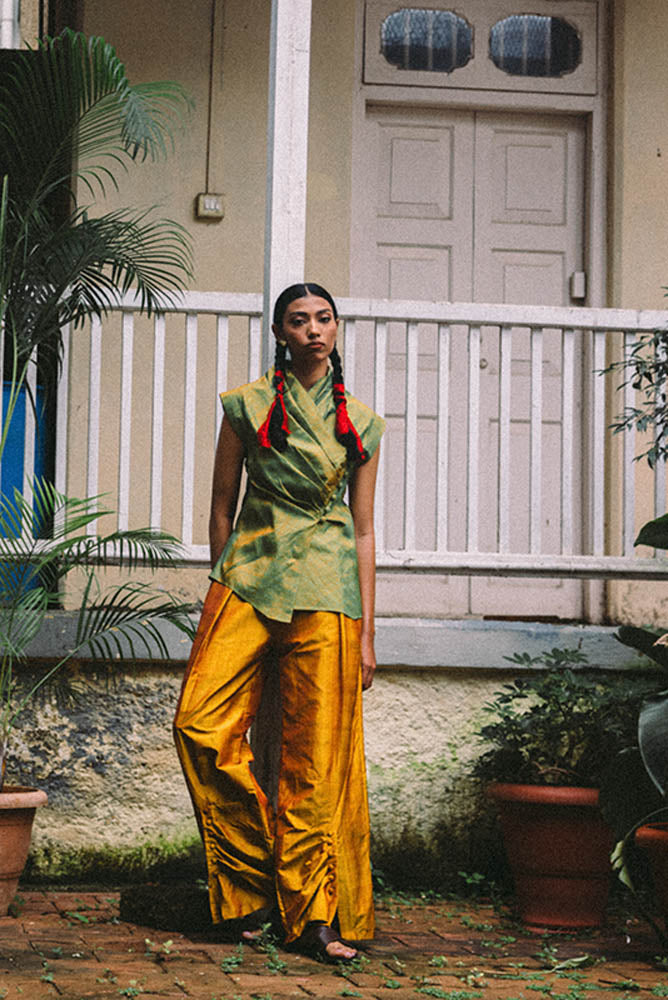 Nivah wide draped trousers gathered at hem for graceful, fluid movement.