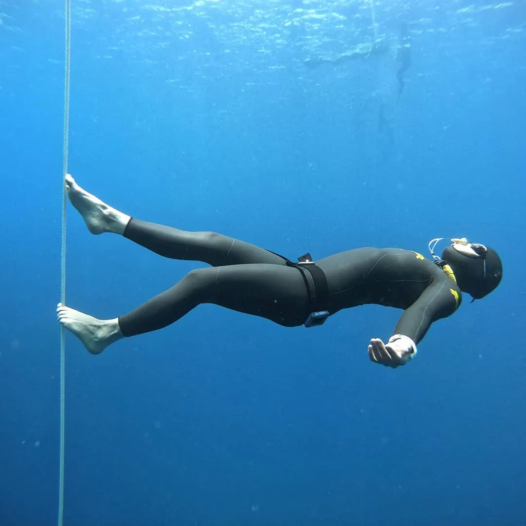 woman freediver meister underwater
