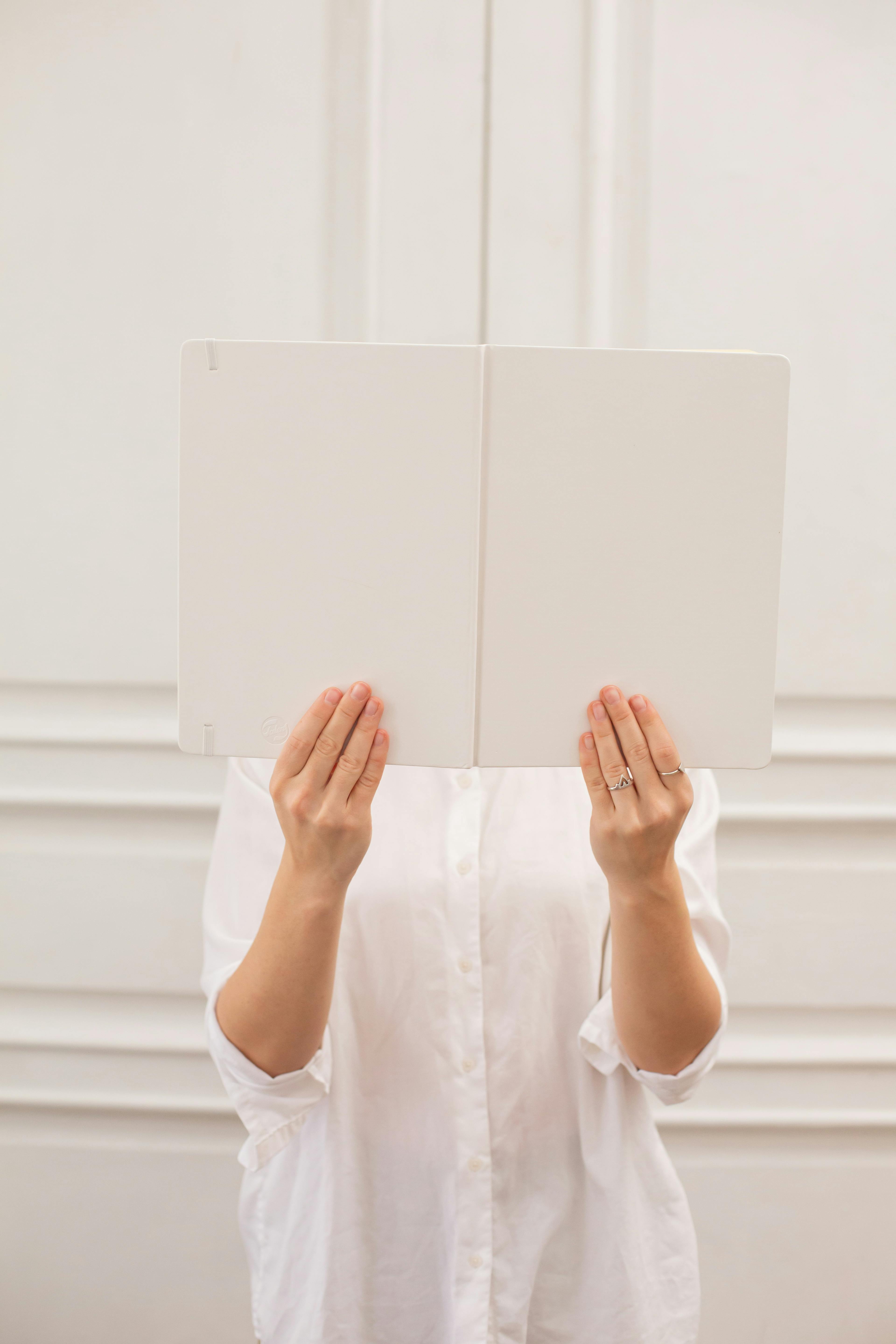 a person sitting in front of a computer screen