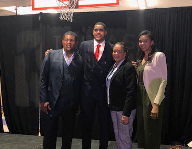 Photographer holding camera