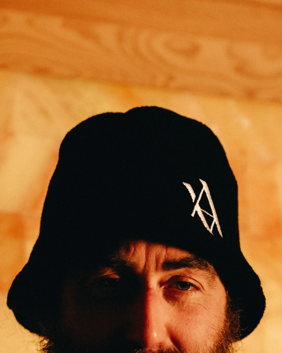 Example of what to wear in a sauna, featuring a traditional felt sauna hat designed to protect the head from intense heat.