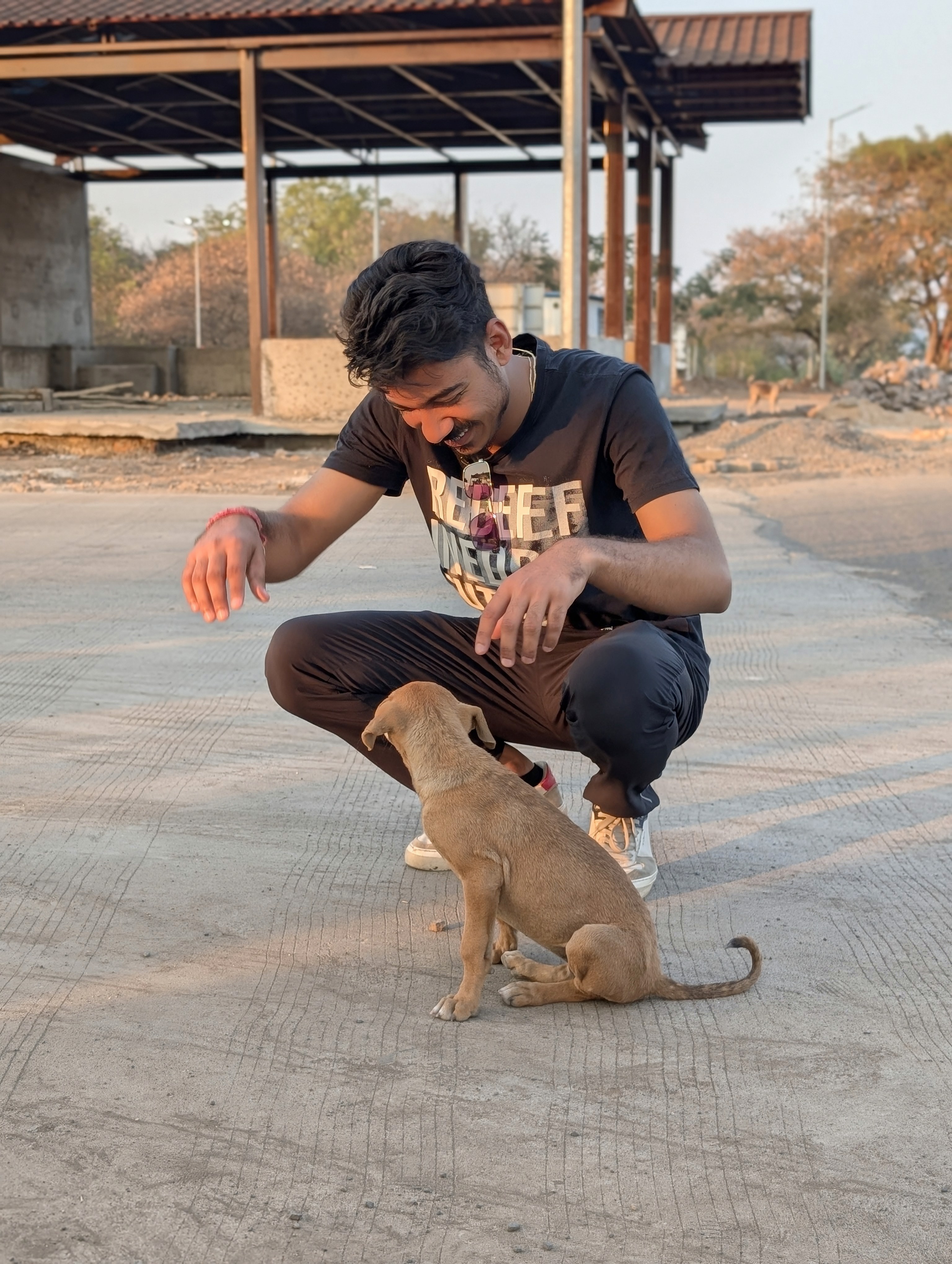 a group of people standing on top of a sandy beach