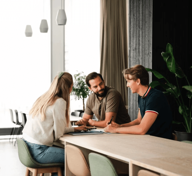 Professional team meeting discussing digital strategy solutions