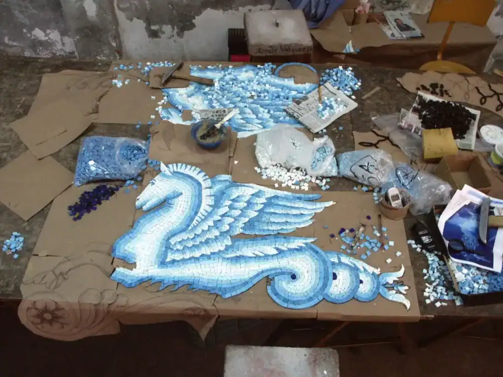 Hand-cut seahorse mosaic panel for an all-tile pool, photographed in the studio — Mosaiclegs Art Studio