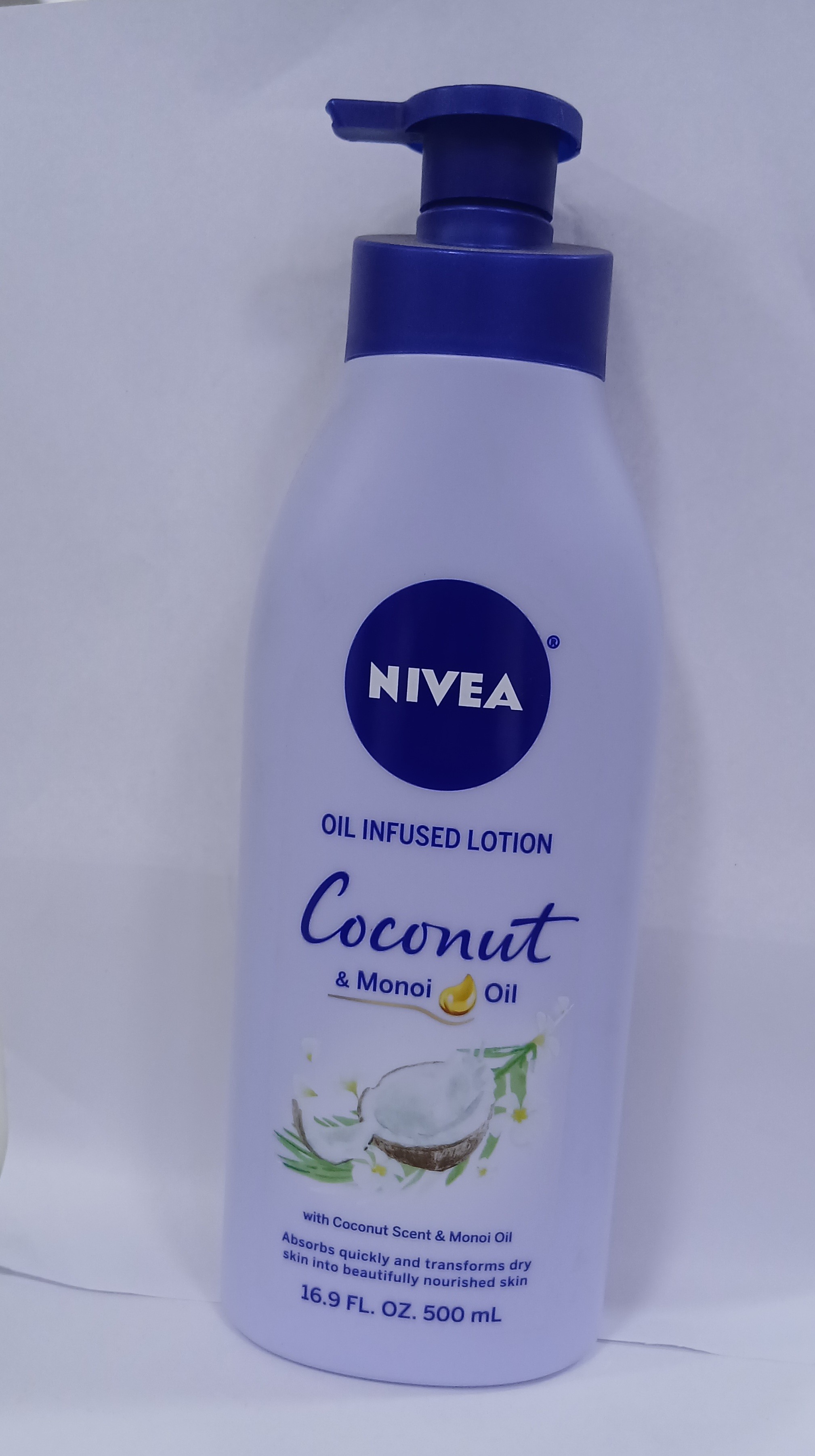 Nivea Oil Infused Lotion Coconut & Macadamia Oil, 36.9 FL OZ (500 mL) pump bottle with purple cap and white label.