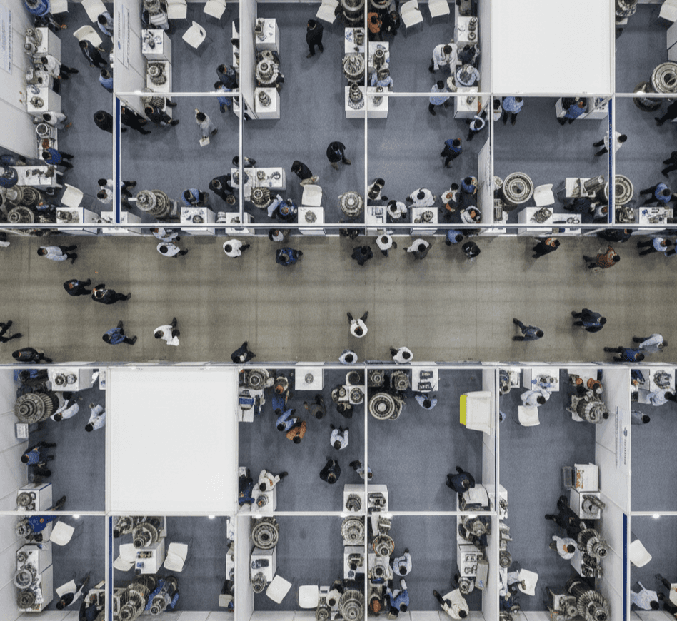 Industrial professionals exchanging contacts and capturing leads at IPTEX 2026 power transmission expo in Pune