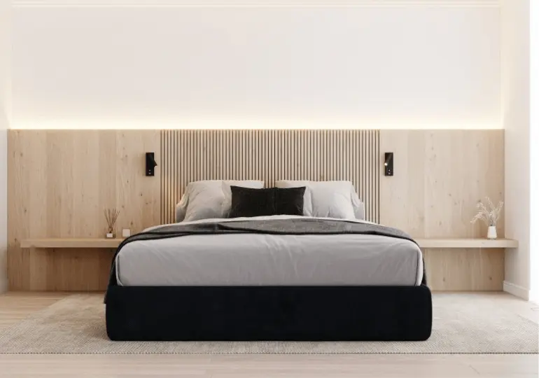 Iluminación Beneito Faure en dormitorio con cama doble y cabecero de madera
